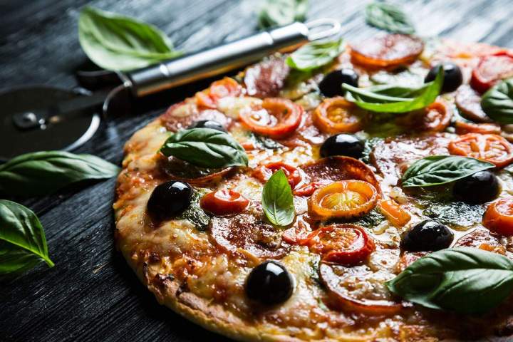 Pizza à base tomate Villefranche sur Saône